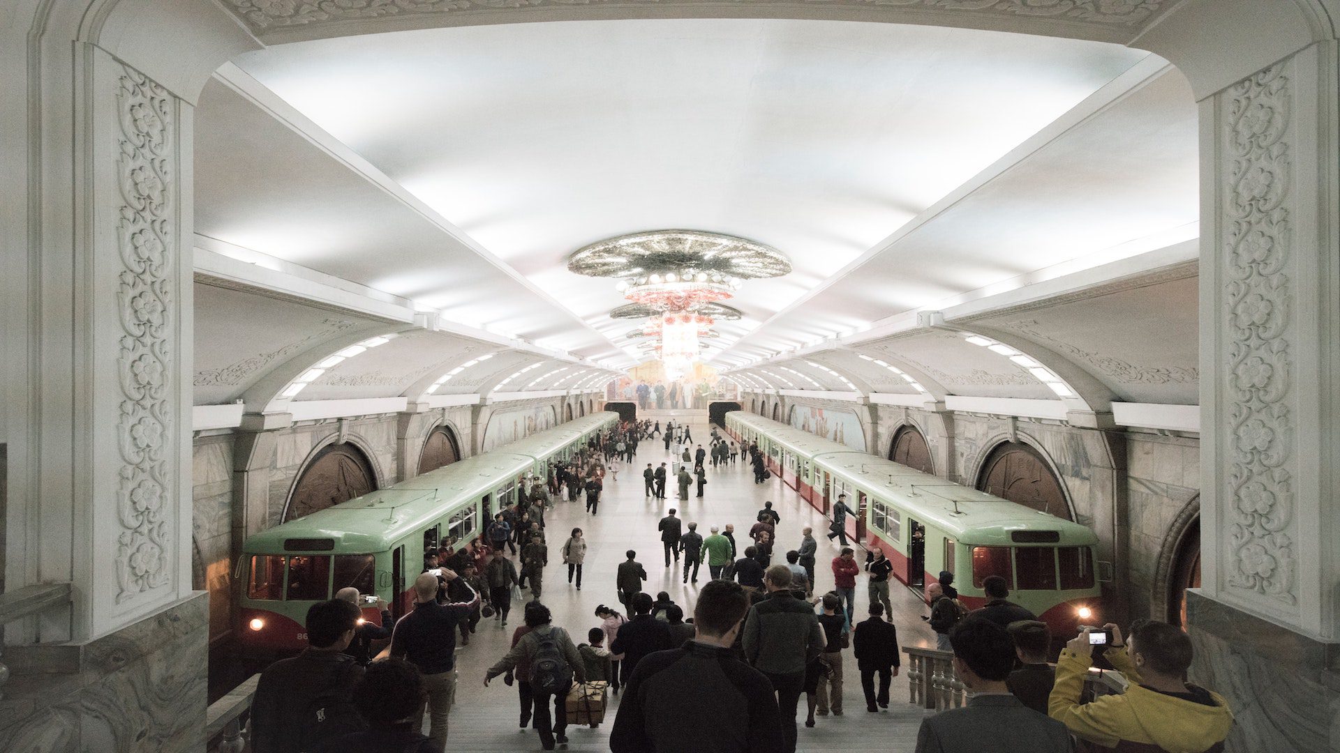 A subway station with people in North Korea.