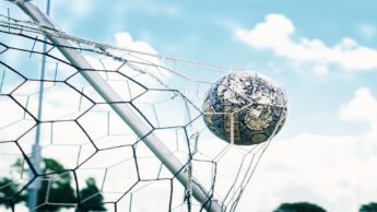 Soccer ball in net.