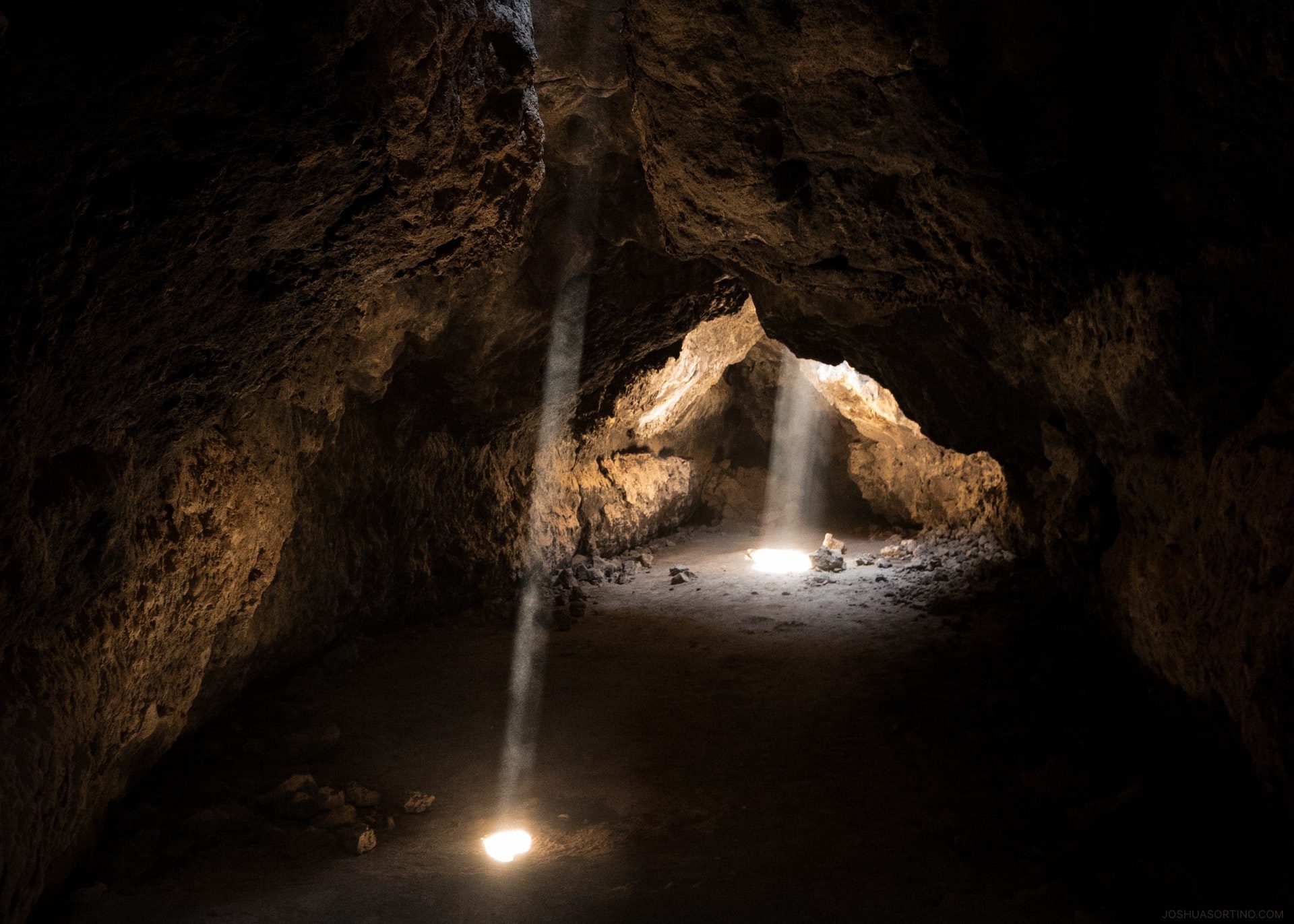 Light shines into a hidden cave.