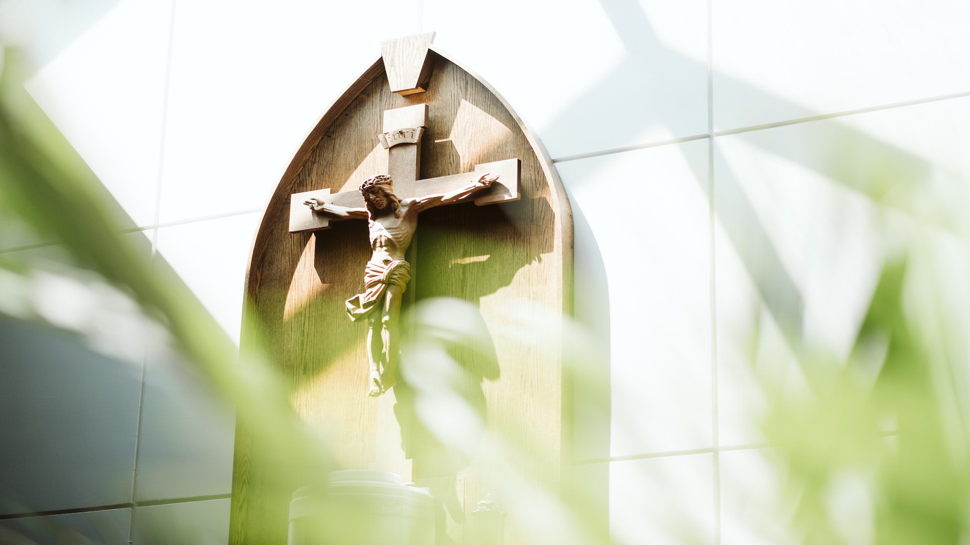 A wood carving that pictures Jesus nailed onto the cross