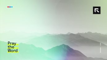 Fog covers mountains in the distance.