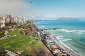 Waves crash near the beach in a Peruvian city.