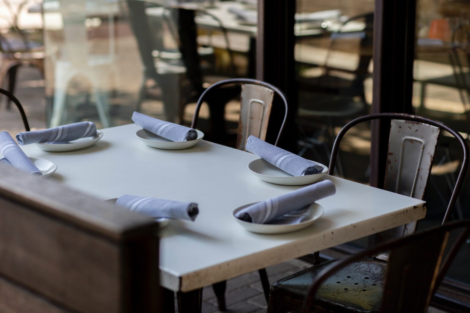 An empty table is set with no food on the table representing fasting.