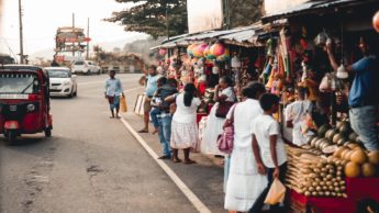 People shopping at street vendors.
