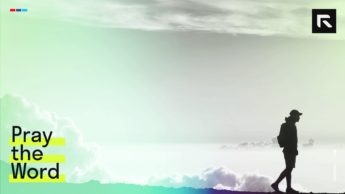 silouhette of person walking under white clouds