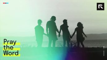 silhouette of family standing beside shore during sunset
