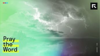 photo of island under thunderous night sky