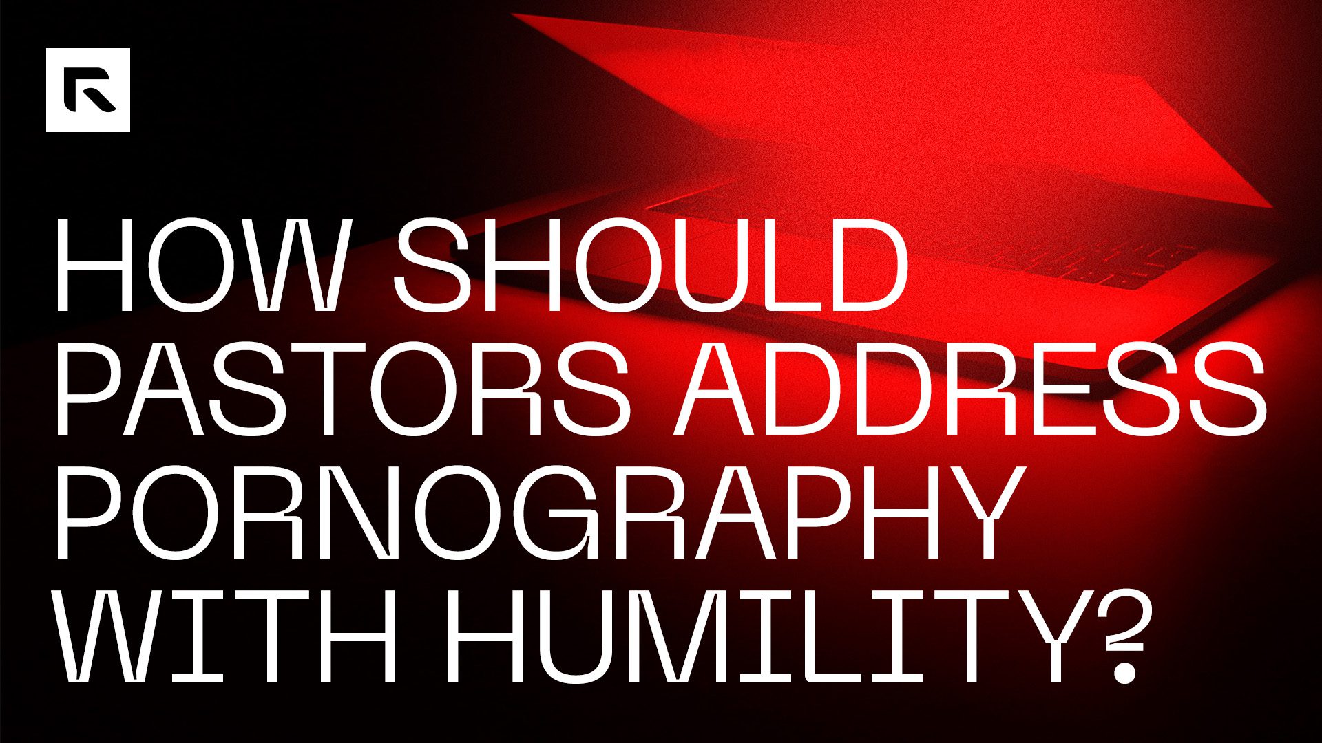A black and red picture with a red light coming from a laptop. The text says "How Should Pastors Address Pornography With Humility?"