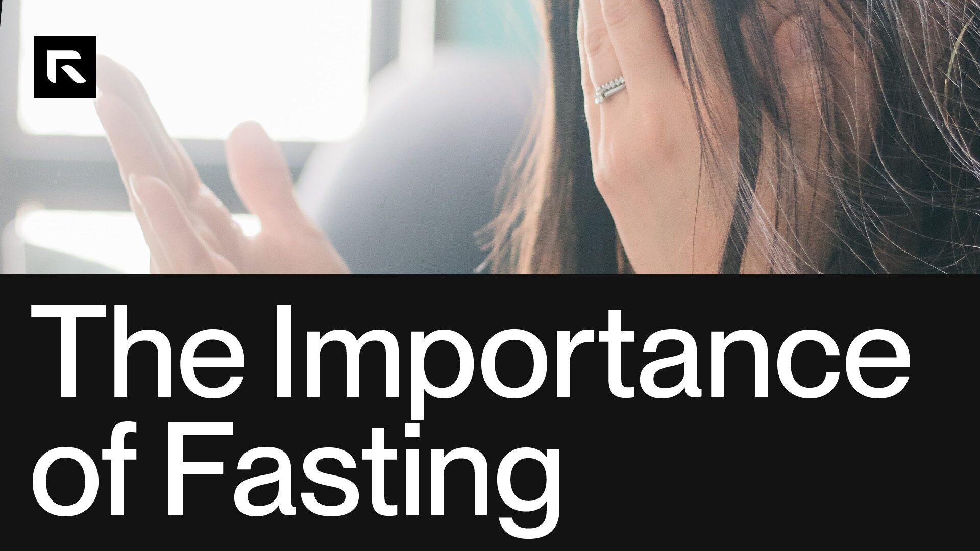 A picture of a woman covering her face and praying with the text "The Importance of Fasting"