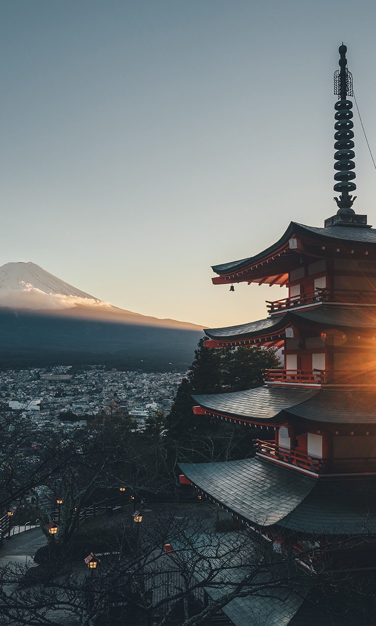 Japanese pagoda temple surrounded by trees