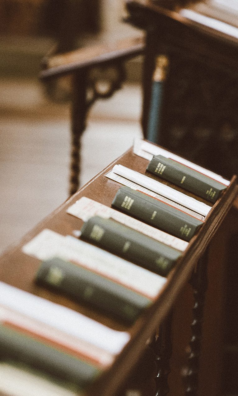 image of prayer pews in a church