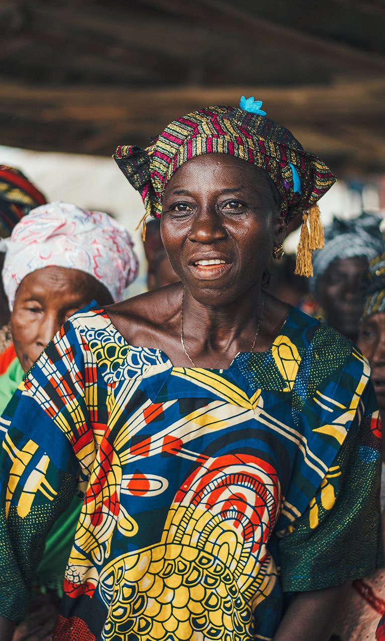 Sierra Leone women wearing traditional outfits