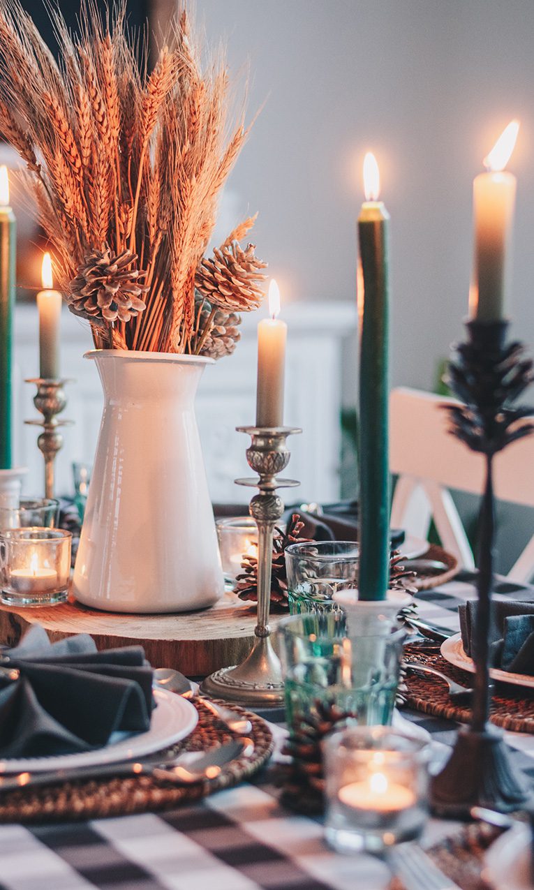 photo of a dining room table set for thanksgiving dinner