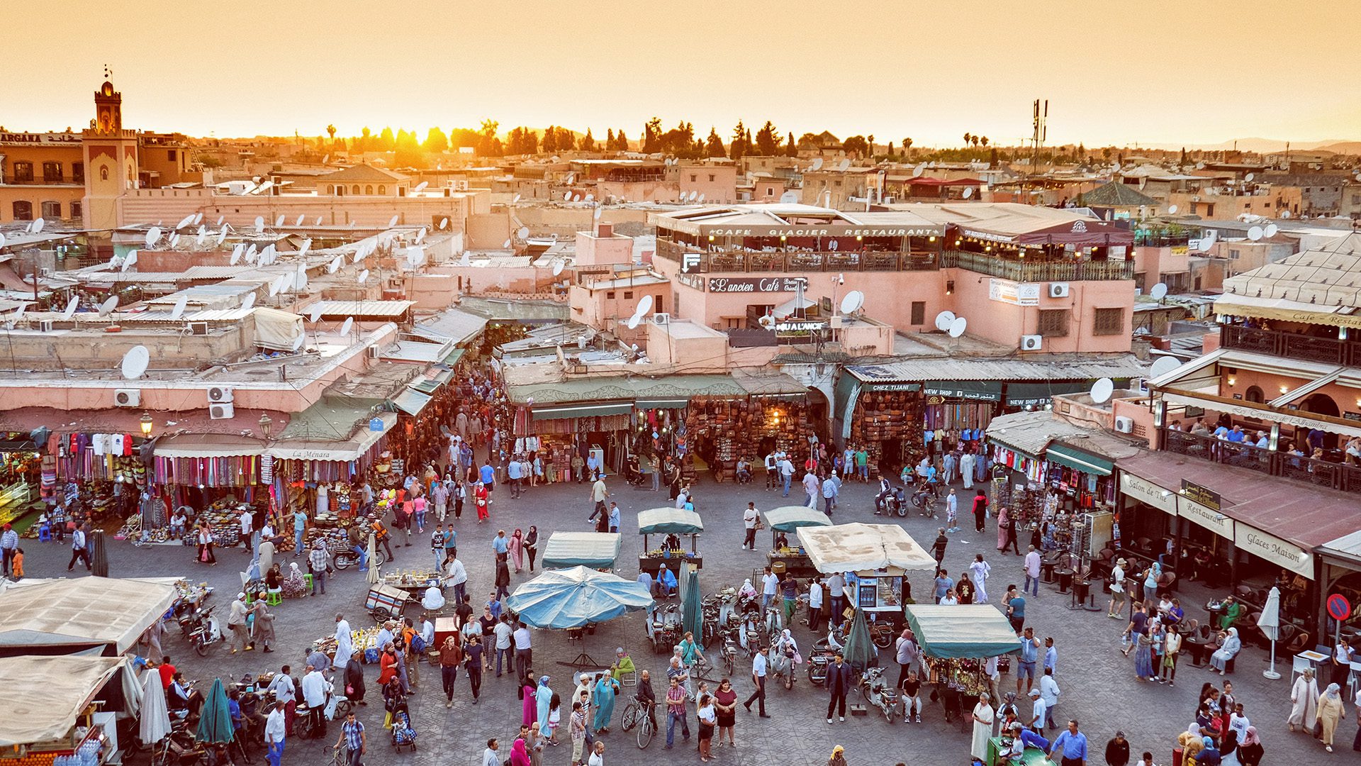 people walking in Marrakech market in Morocco