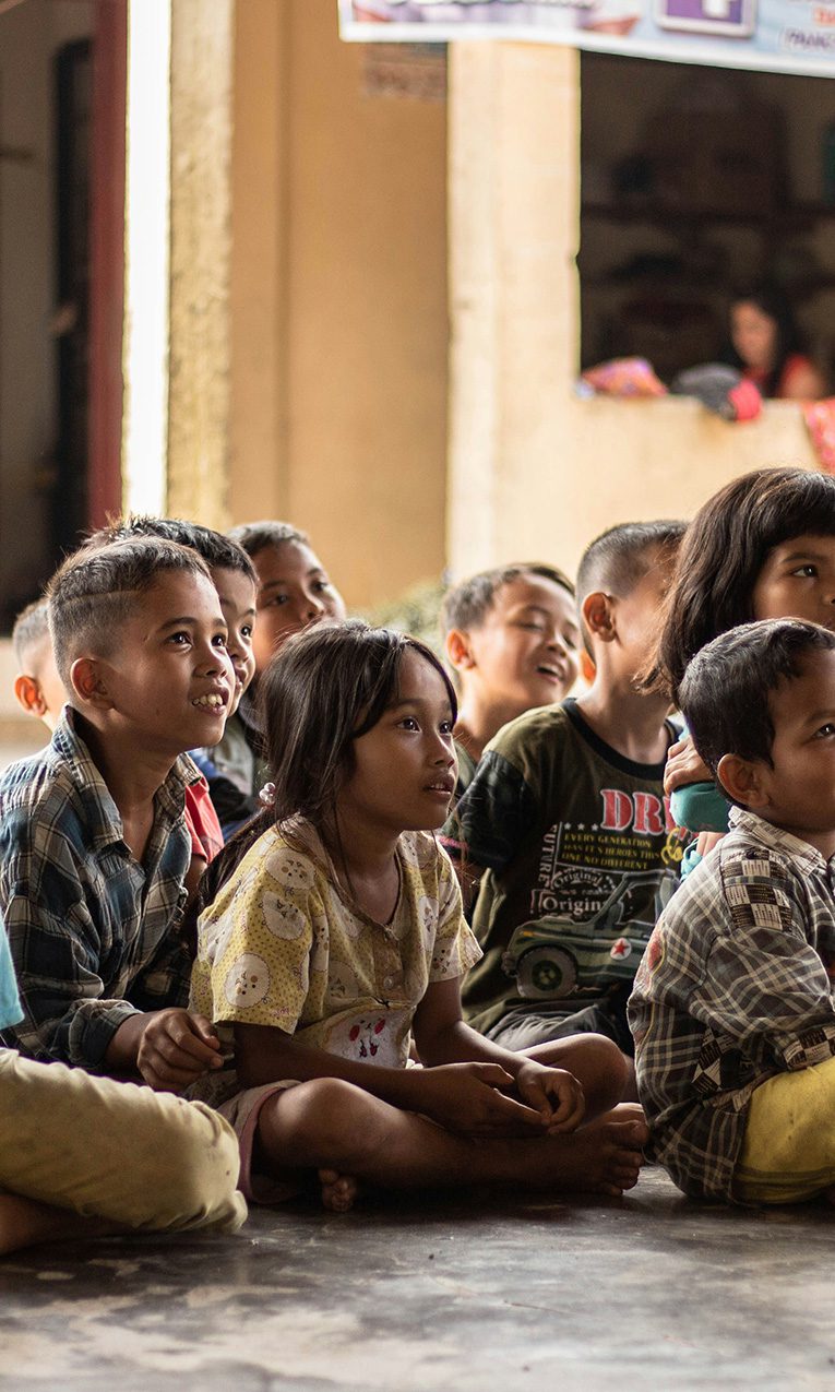 group of children sitting on the floor