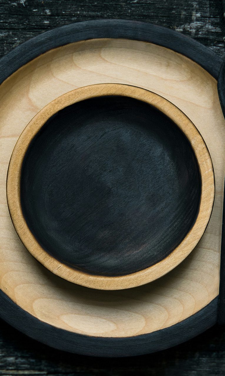 empty black wooden plates