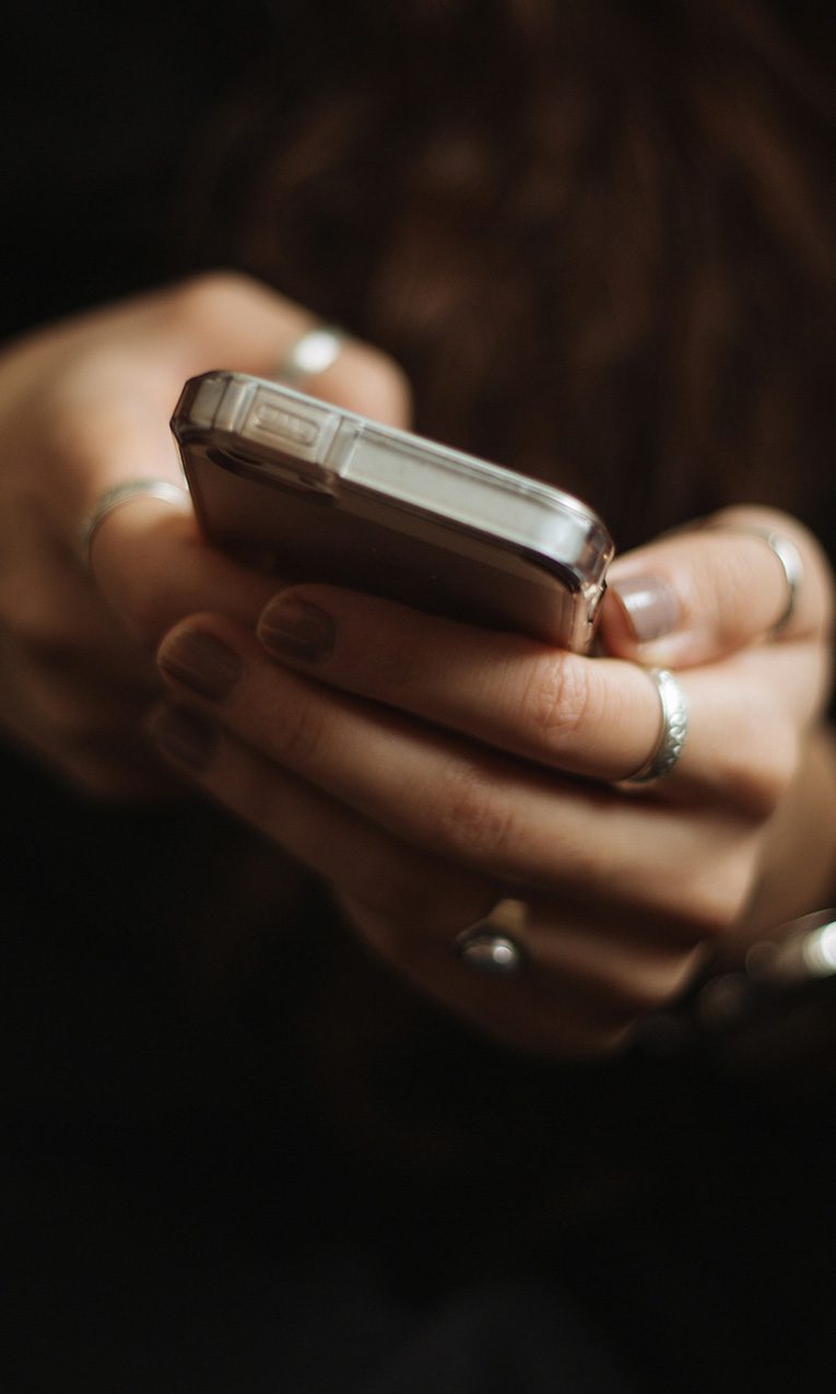a woman using her phone