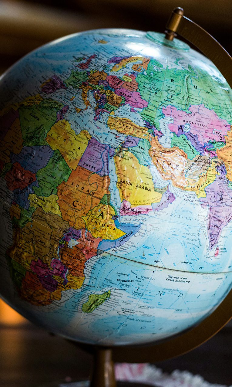 a globe map sitting on a desk