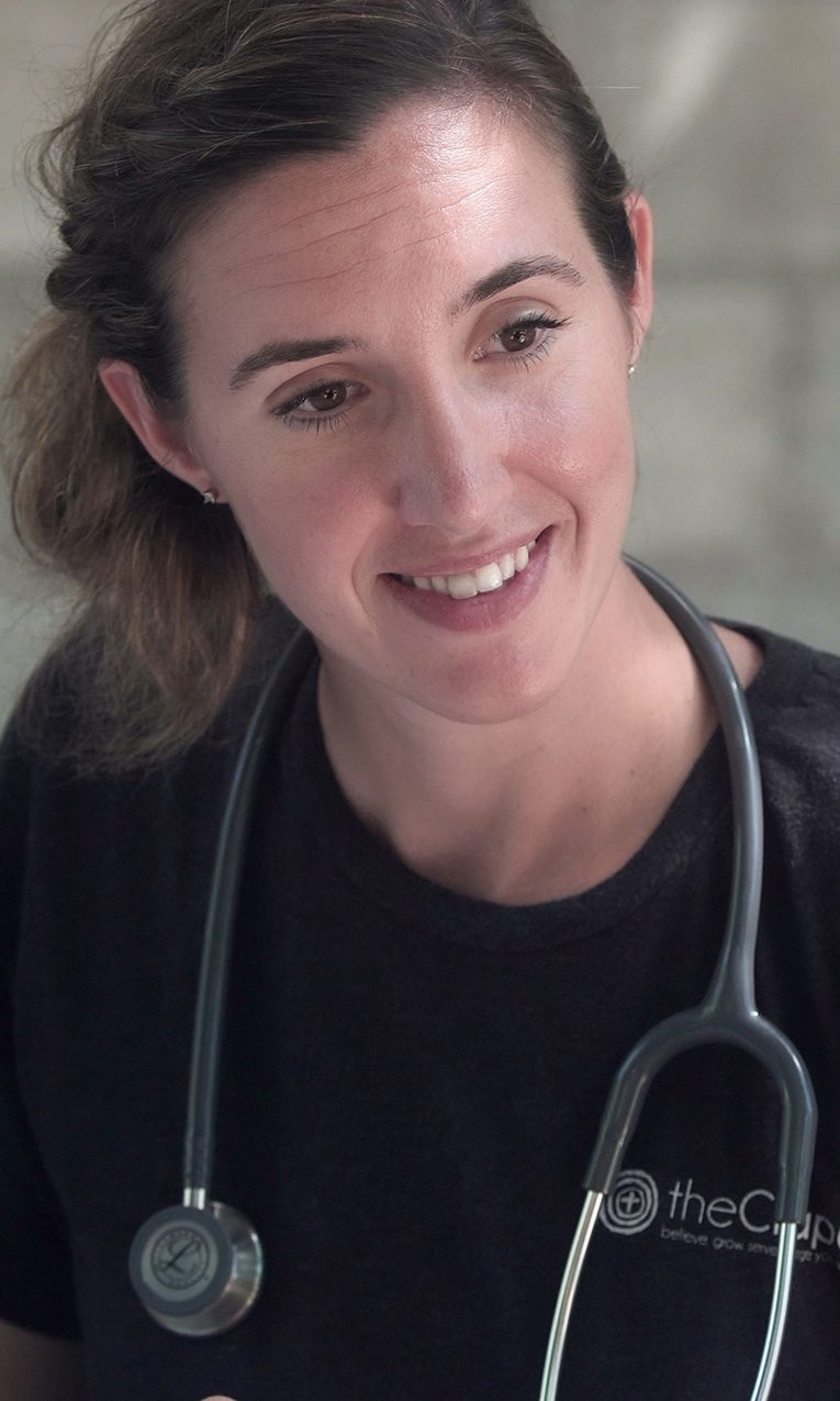 a nurse caring for a patient