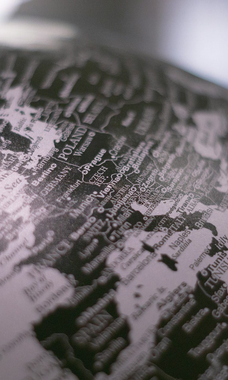 black and grey desk globe map