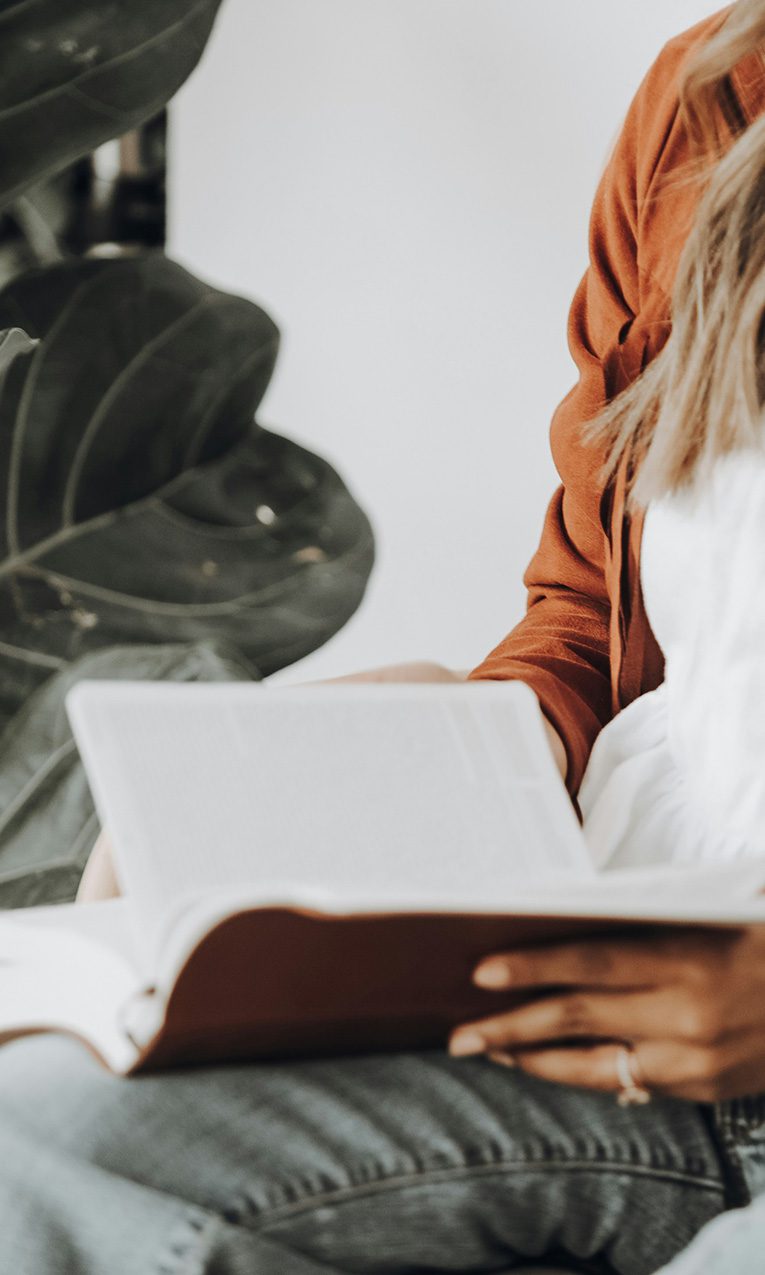 woman reading a Bible