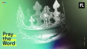 A golden crown above a crown of thorns.