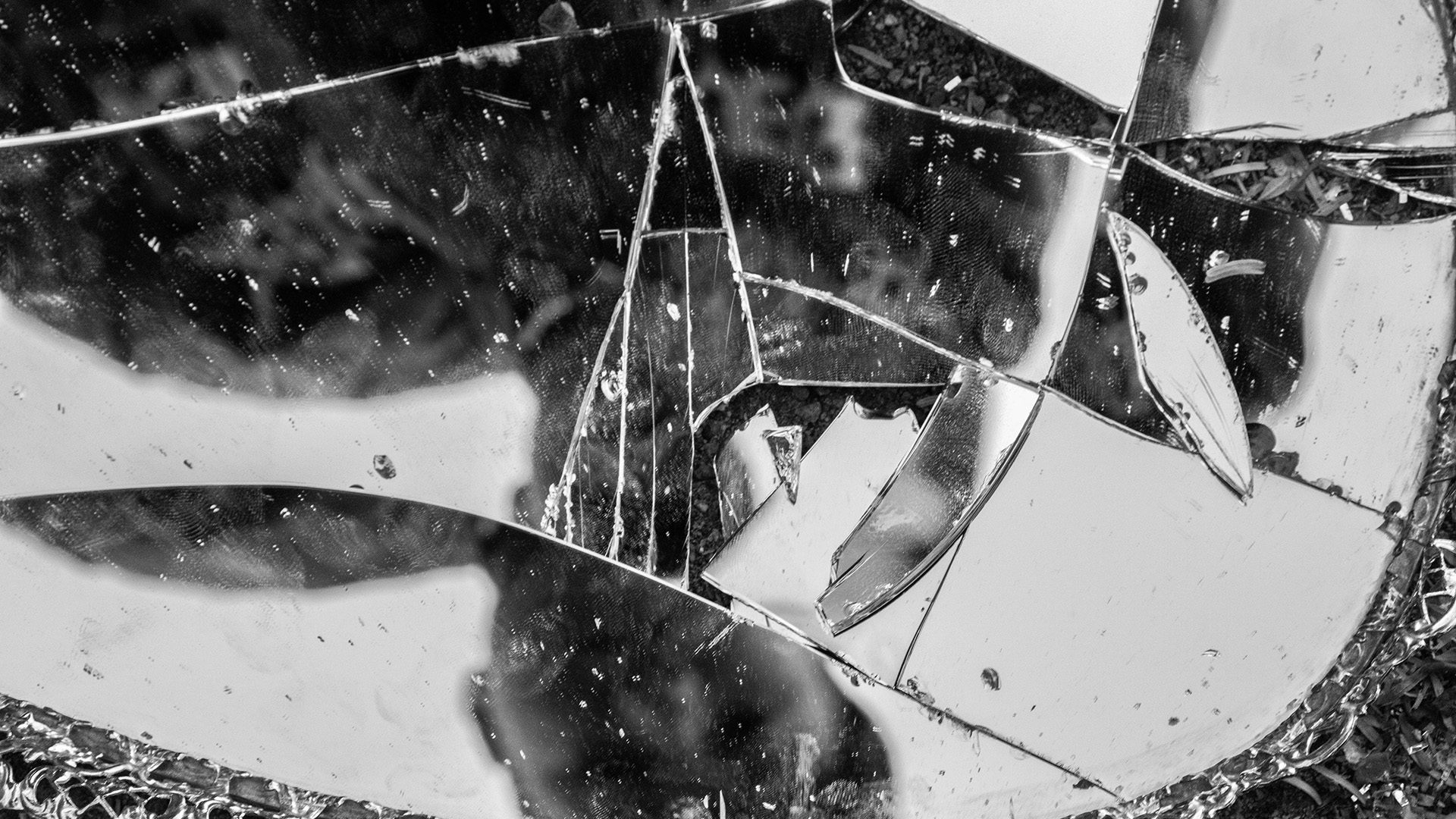 a broken mirror on the floor