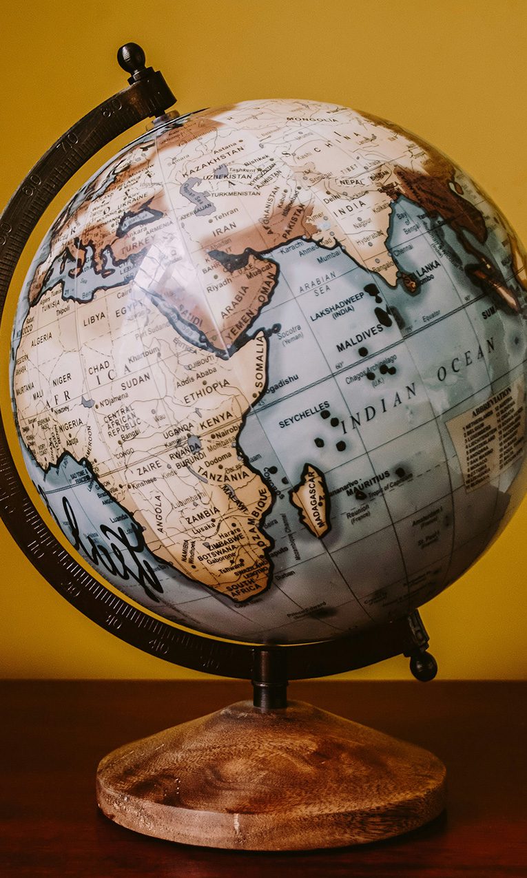 a globe map on a desk