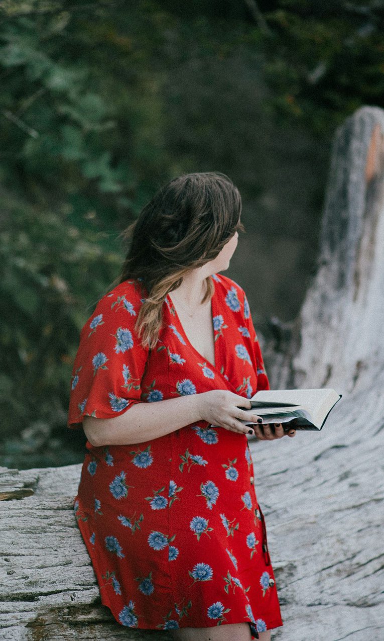 A woman reading the Bible.