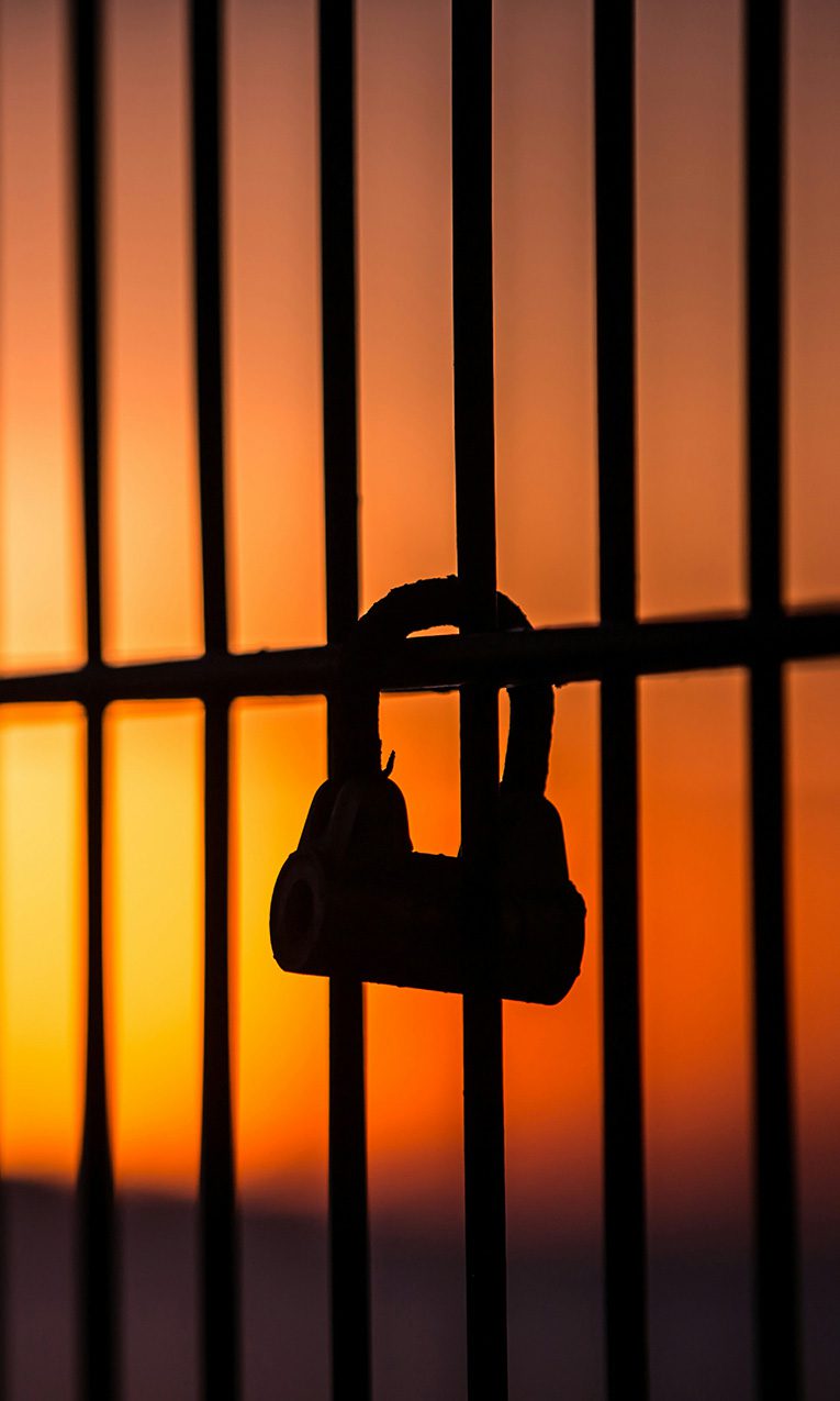 Silhouette of jail bars.