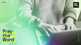 A woman typing in her computer.