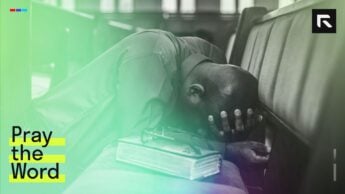 A man praying at church.