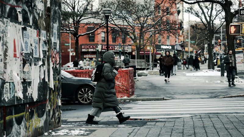 A woman walking in the street.