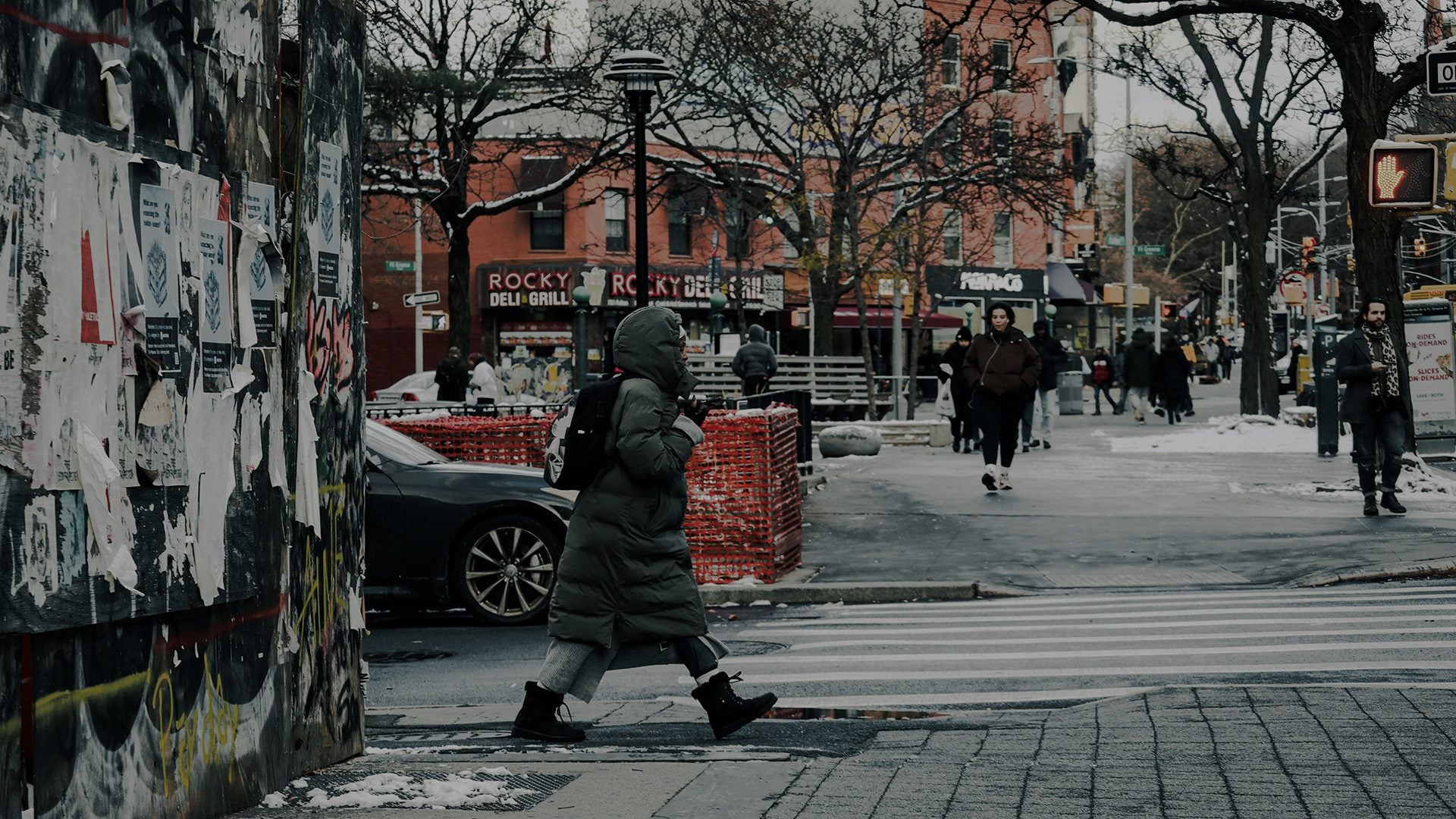 A woman walking in the street.