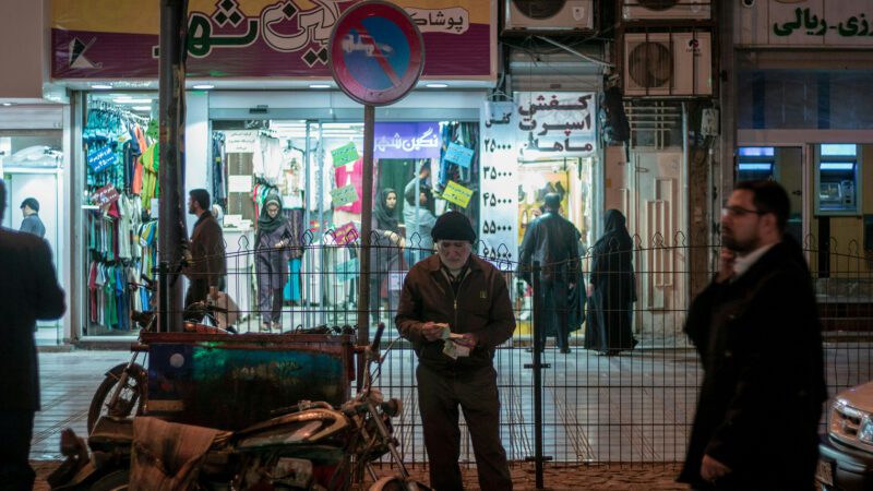 People walking in the streets of Iran.