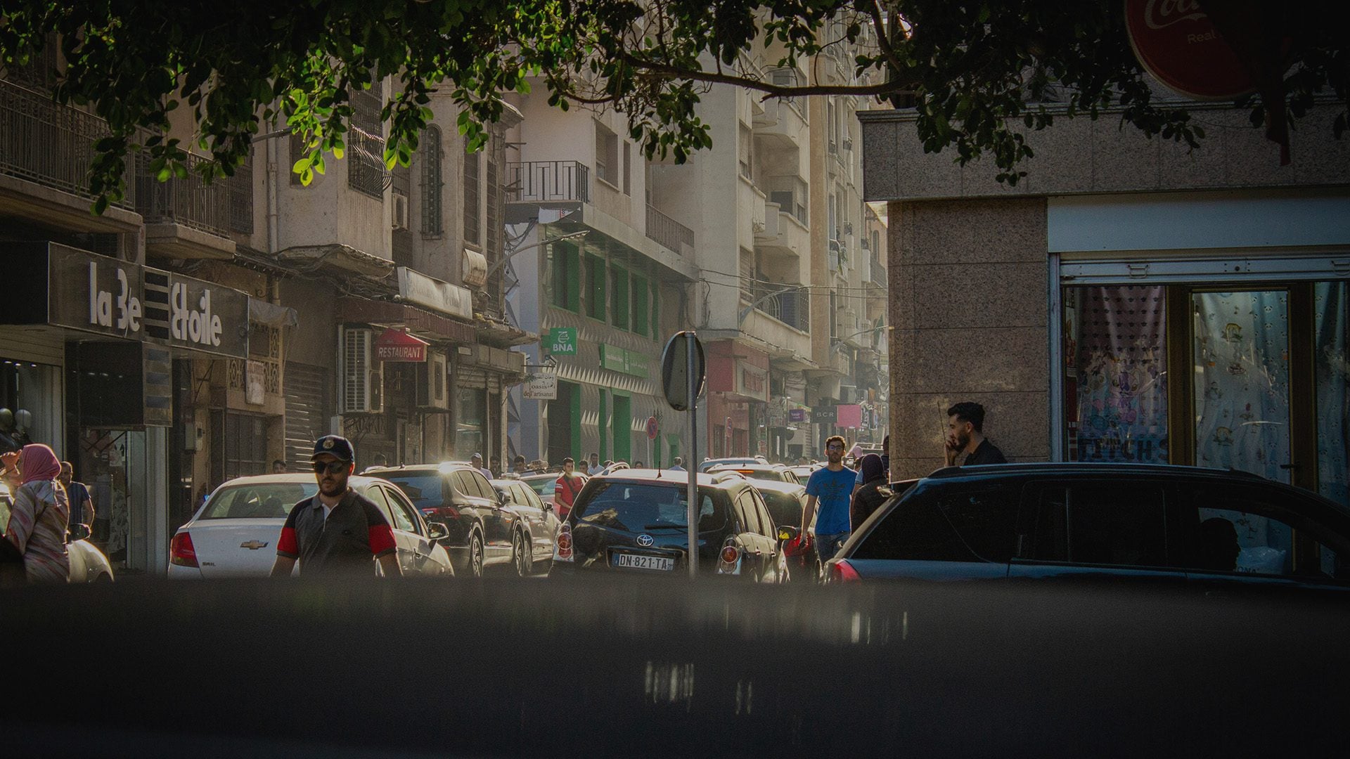 People walking on a busy street.