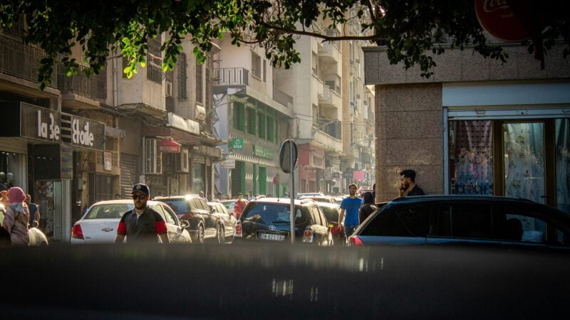 People walking on a busy street.